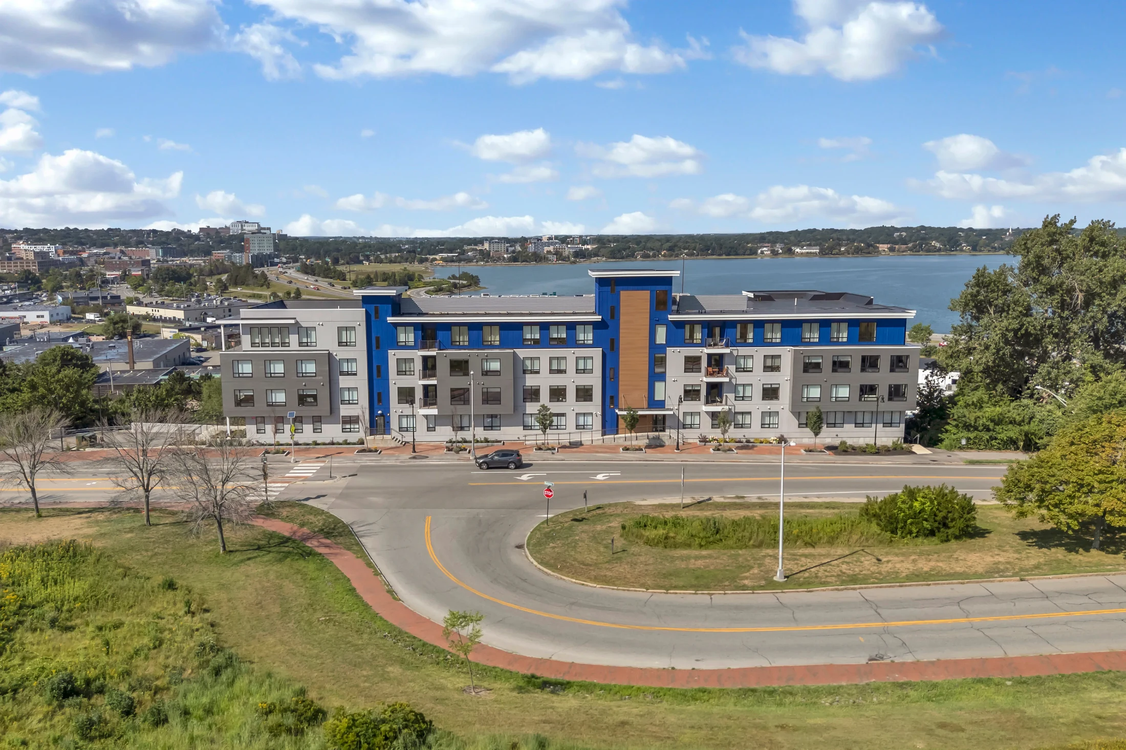 Aerial exterior view of 218 Washington Avenue with water beyond